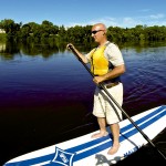 paddleboarding the mississippi river in minneapolis